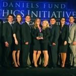 A team of UCCS students pose following their selection as first place winners of a Daniels Ethics Initiative Case Competition.