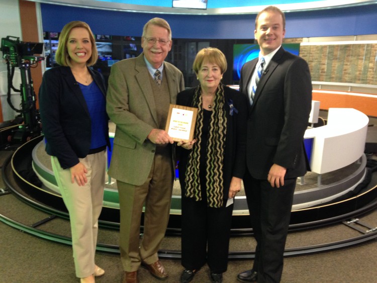 The Festival of Lights Parade presented a $500 check to support a UCCS scholarship at KKTV studios. From left, Sarah Schwabe of KKTV, Dr. Terry Collinson of the Festival of Lights, Chancellor Pam Shockley-Zalabak and David Nancarrow of KKTV.