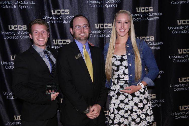 Thomas F. McLaughlin Award winners. Cort Searls and Kim Catlett pose with Jared Verner, assistant athletic director
