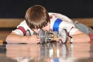 A Middle School student participates in the 2010 State Science Olympiad Battery Buggy competition.