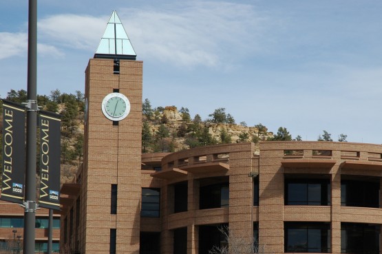 Kraemer Family Library / El Pomar Center bell tower in front of the bluffs