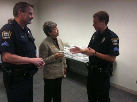 Terry and Dewey talk at the 2011 Cops, Coffee and Doughnuts event
