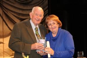 Jim Rynning, left, accepts a Special Chancellor's Award from Chancellor Pam Shockley-Zalabak in 2009.