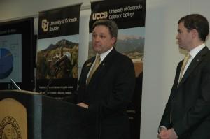 Brian Burnett speaks at a meeting of the CU Advocates while Todd Saliman waits for his turn.