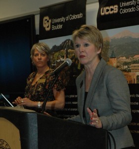 CU Regent Sue Sharkey speaks at a meeting of the CU Advocates while event organizer Michele McKinney stands by.