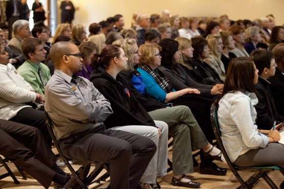 Faculty and staff listen as President Bruce Benson provides a university update Monday afternoon in Berger Hall.