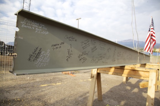 UCCS faculty and staff, along with Colorado Springs community leaders wrote their names and inspirational quotes on the last piece of structural steel for the Lane Center for Academic Health Sciences.