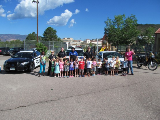 UCCS police officers pose for a group picture with FDC students and staff.