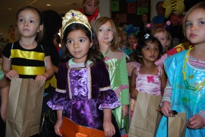 Youngsters trick-or-treat at campus residence halls in 2012.