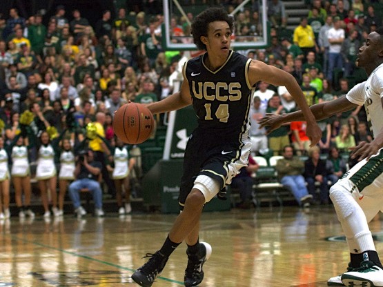 UCCS guard Derrick White drives past a Colorado State defender, Nov. 8