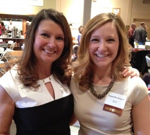 Jane Young, left, past chair of the College of Business Alumni Association, congratulates Samantha Bruner, right. 