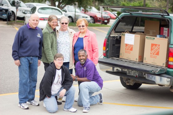 A group of Beth-El College of Nursing and Health Sciences faculty and staff pause during the loading of more than 1,000 items destined for Clyde's Cupboard. From left: Steve Campbell, custodian, Facilities Services; Susan Garrett, instructor; Diane Busch, program manager; Linda Matthies, program manager; Sharon Clark, program manager; Art Drummond, custodian, Facilities Services.