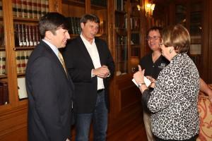 El Pomar Endowed Chairs (from left) Michael Larson, Tom Duening and Terry Boult chat with Chancellor Pam Shockley-Zalabak at Penrose House Conference Center.