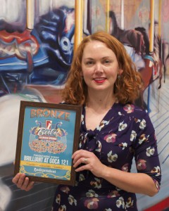Daisy McConnell hold's the CS Indy's Best of 2014 award