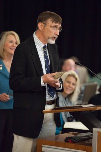 Tom Wynn, professor, Department of Anthropology, shared a 30,000 year old hand axe with members of the CU Board of Regents.