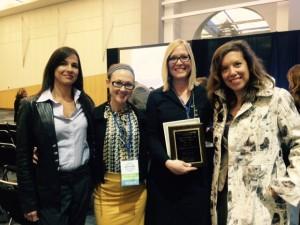 Julaine Field, associate professor, College of Education, celebrates her counselor educator award. From left: Janaina Toledo, student, Valerie Boughton, student, Field, and Tina Reyero, student.