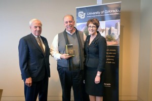 Ralph Giese was honored April 3 with the Staff Council Service Excellence Award. From left, President Bruce Benson, Giese and Susan Szpyrka, vice chancellor, Administration and Finance.