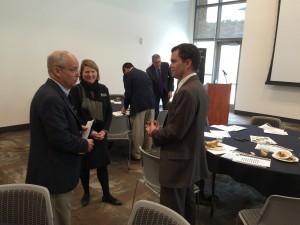 Todd Saliman, right, talks with members of the CU Advocates following a March 4 presentation.