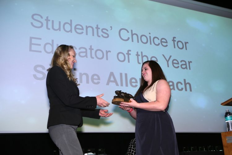 Sabine Allenspach accepts her Student's Choice for Educator of the Year Award.