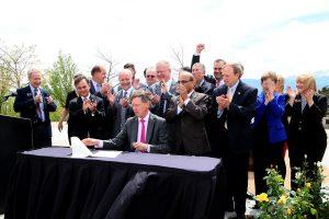 Gov. John Hickenlooper signs the Colorado Cybersecurity Initiative bill into law at UCCS on May 20.