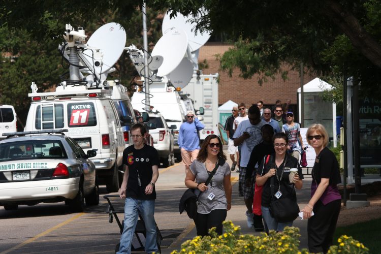 Satellite trucks lined the campus during the Trump event.