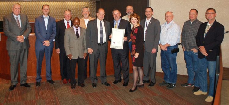 The Board of El Paso County Commissioners proclaimed October as National Cyber Security Awareness Month on Oct. 20. Pictured, from left, are: County Administrator Henry Yankowski, NCC Deputy Executive Director Eric M. Hopfenbeck; Commissioner Vice Chair Darryl Glenn, Commissioner Dennis Hisey, Commissioner Mark Waller, Commission Chair Sallie Clark and El Paso County IT Director Jeff Eckhart and three unknown El Paso County employees. 