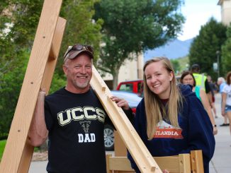 A student and her dad move in during fall 2017.