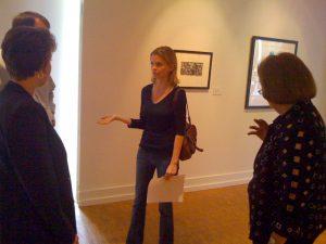 Caitlin Green, interim director, Gallery of Contemporary Art, Andrea Cordova, executive assistant, Office of the Chancellor, Chancellor Pam Shockley-Zalabak and Tom Christensen, dean, College of Letters, Arts and Sciences tour exhibit space in the Plaza of the Rockies building.