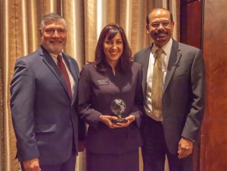 Megan Bell receives the CU Excellence in Leadership Program award