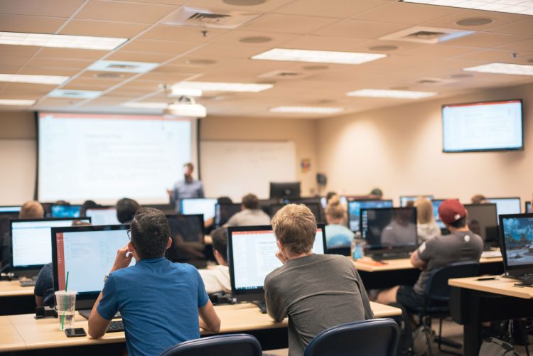 Students in a computer lab during a summer 2018 class session.