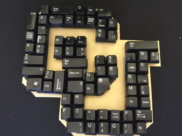 The CU logo made out of keyboard keys