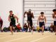 Sprinters in the 60-meter dash at Mountain Lion Fieldhouse