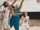 Three Mountain Lion women's basketball student-athletes defend a Fort Lewis College shooter