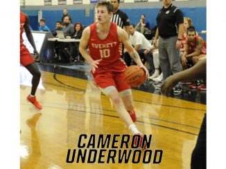 Cameron Underwood dribbles the basketball