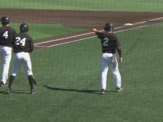 A screenshot of UCCS baseball student-athletes on the field