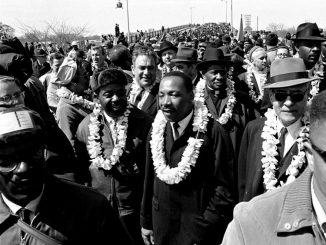 Martin Luther King leads marchers on the Edmund Pettus Bridge