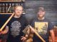 Tim Martin and Mike Sonderby pose with axes in their new restaurant