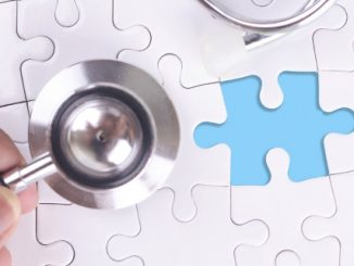 A puzzle with a missing piece with a stethoscope