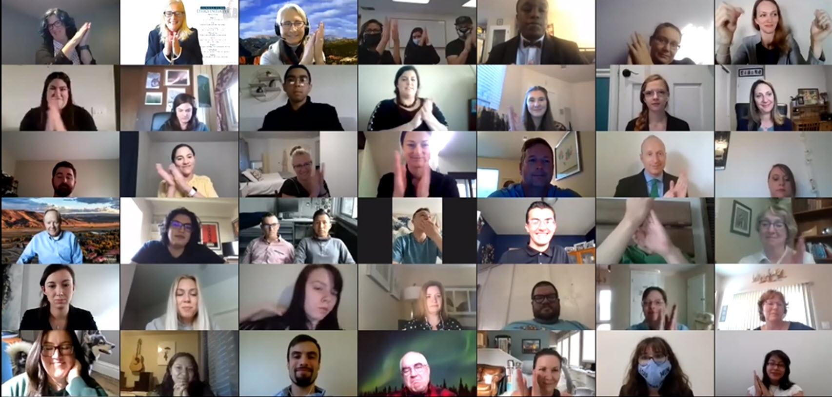 A screen capture of 42 people clapping in a virtual event