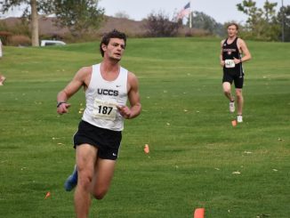 Charlie Kieffer running in a cross country race