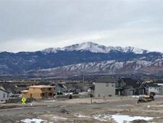 New homes under construction with Pikes Peak in the background