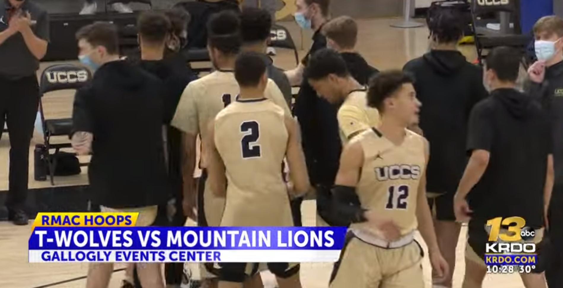 The UCCS men's basketball team after breaking a huddle
