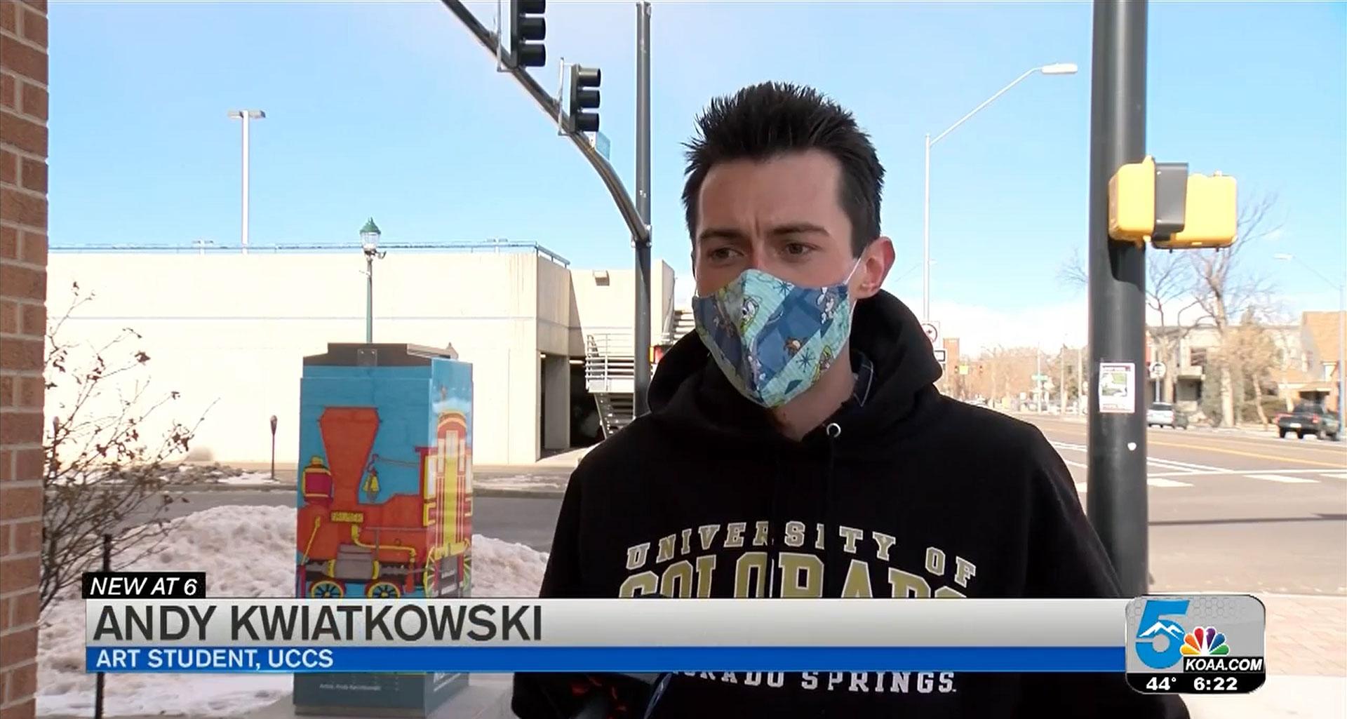 A screenshot of Andy Kwiatkowski doing an interview in downtown Colorado Springs