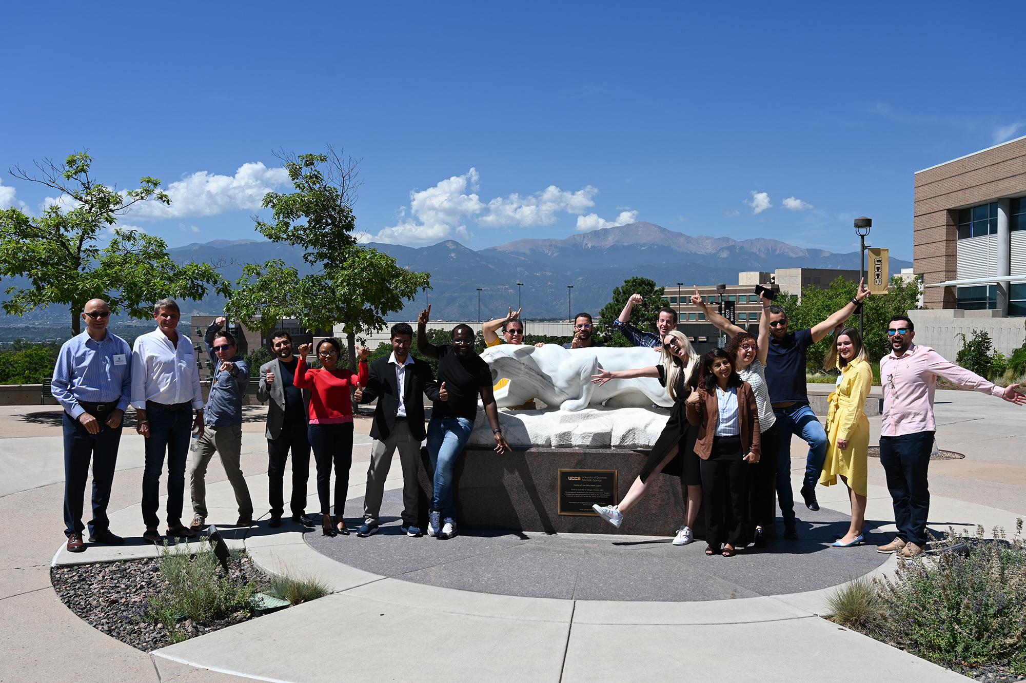 International Leaders Visit The Garage At UCCS UCCS Communique   International Group Lion Statue 